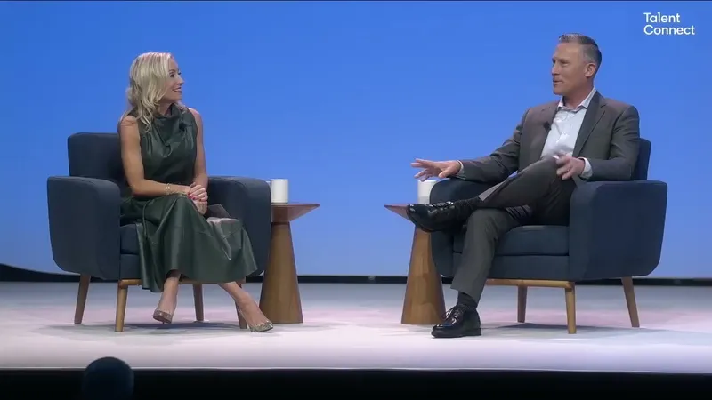 Alyssa Merwin of LinkedIn and Scott McGuckin of Cisco talking in armchairs on the Talent Connect 2026 stage